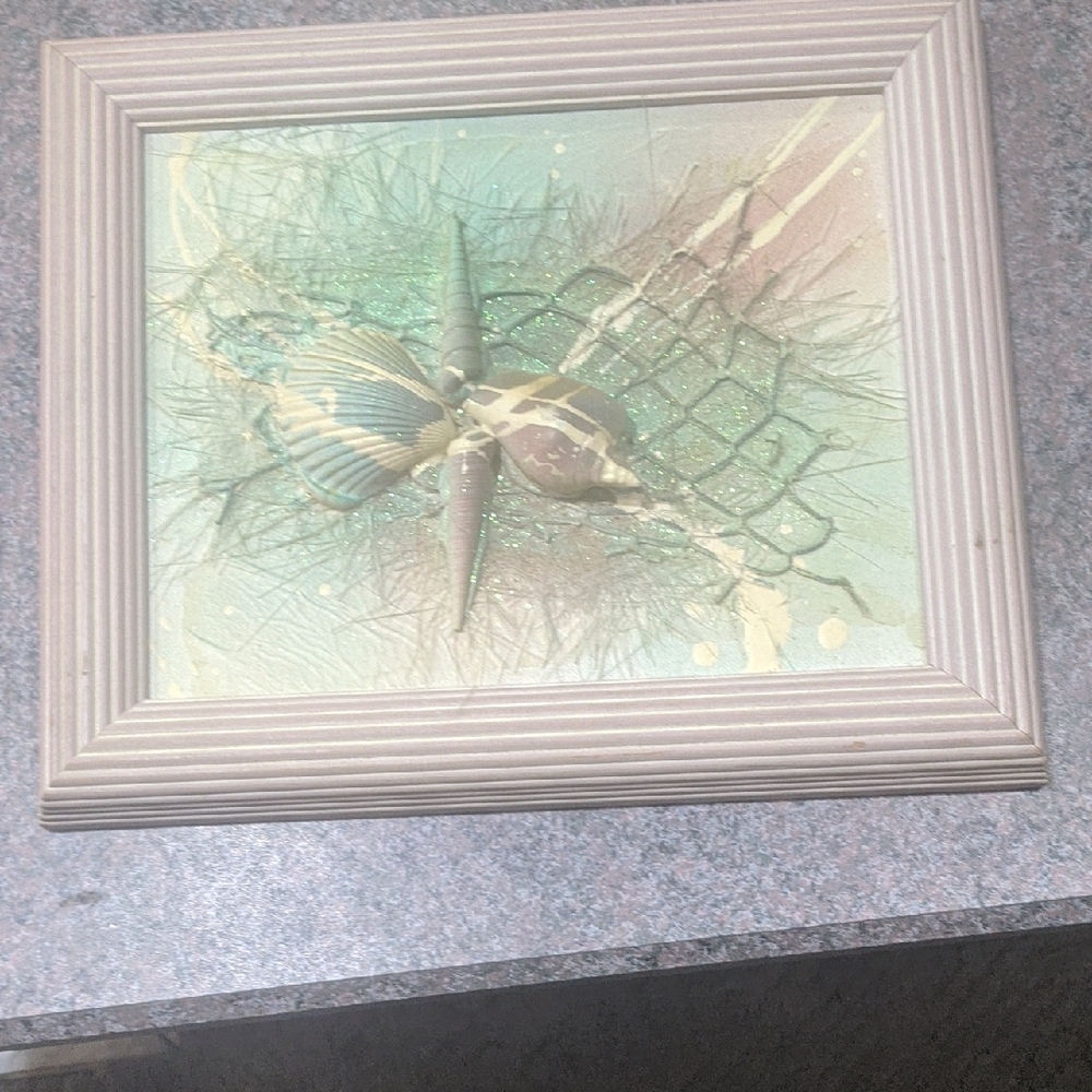 Framed Seashell Art with Textured Design